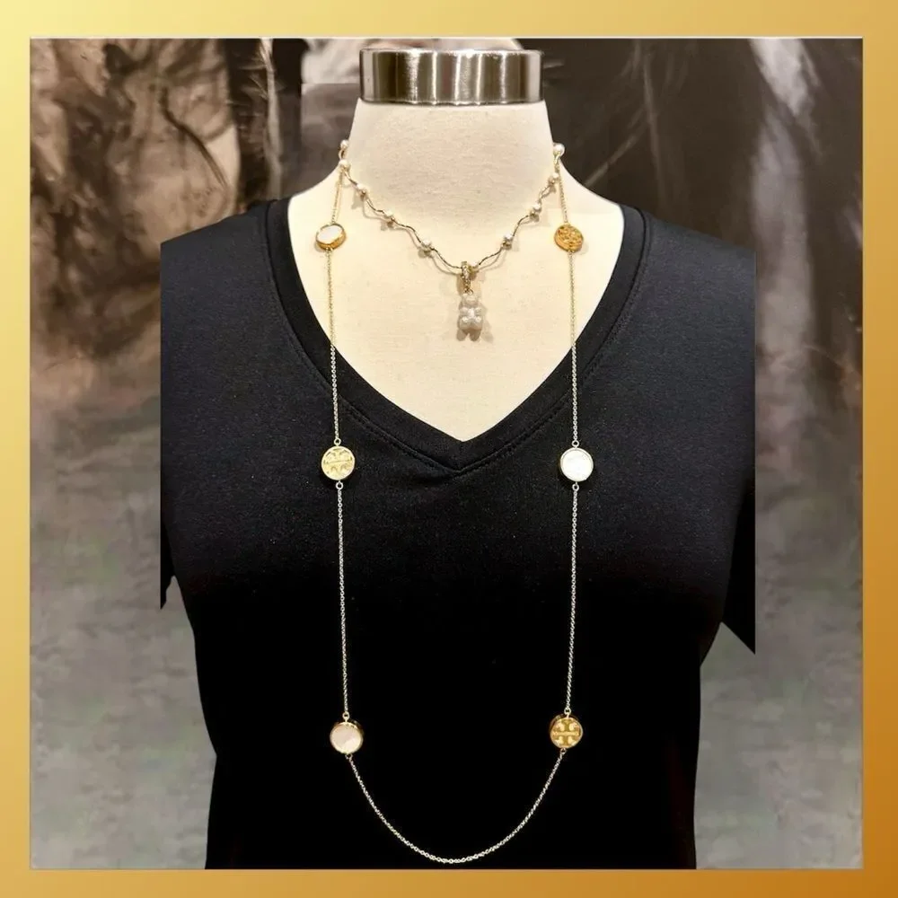TORY BURCH 18K GOLD AND MOTHER OF PEARL DOUBLE T LOGO NECKLACE